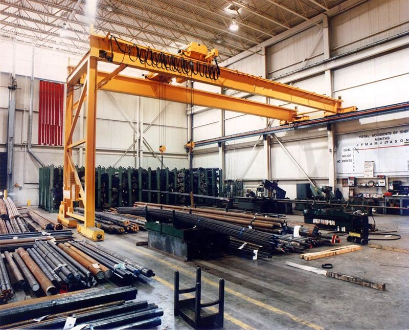 Industrial overhead crane in large manufacturing facility